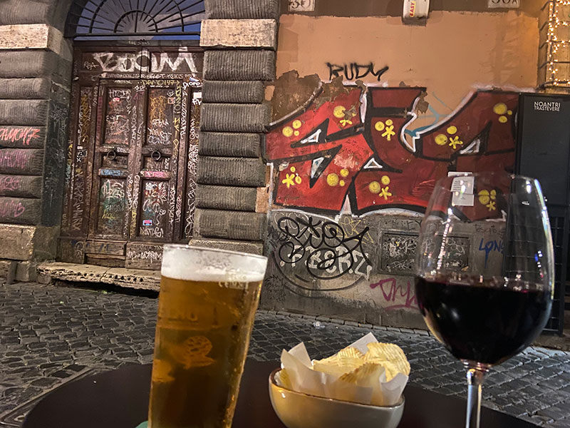 Our Drinks in Trastevere with free snack of potatoes chips.
