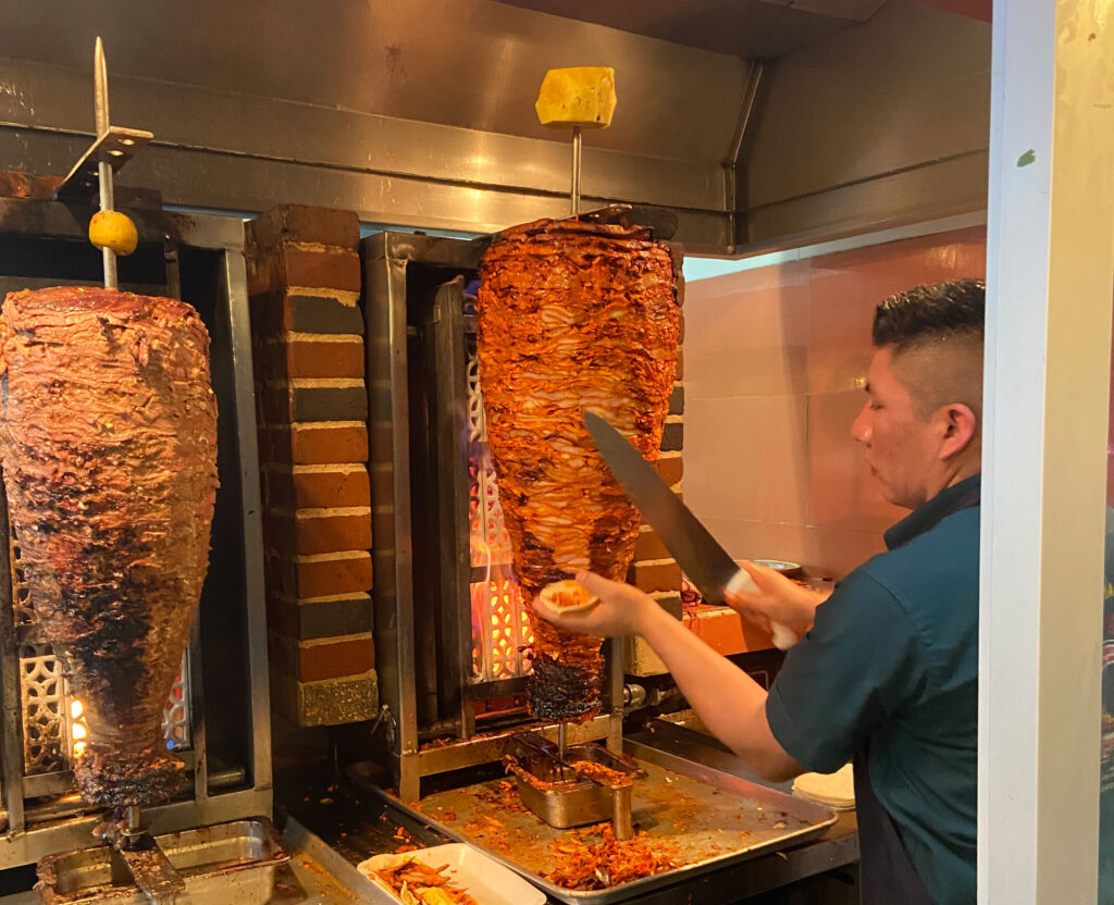 El Fogón Playa del Carmen al pastor tacos on the trompo