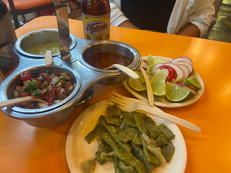 At El Fogón in Playa del Carmen, you'll find a variety of fresh, flavorful salsas, including Salsa Verde (green), Salsa Roja (red), and Pico de Gallo, served with lime and cucumber to complement their popular tacos and Mexican dishes.