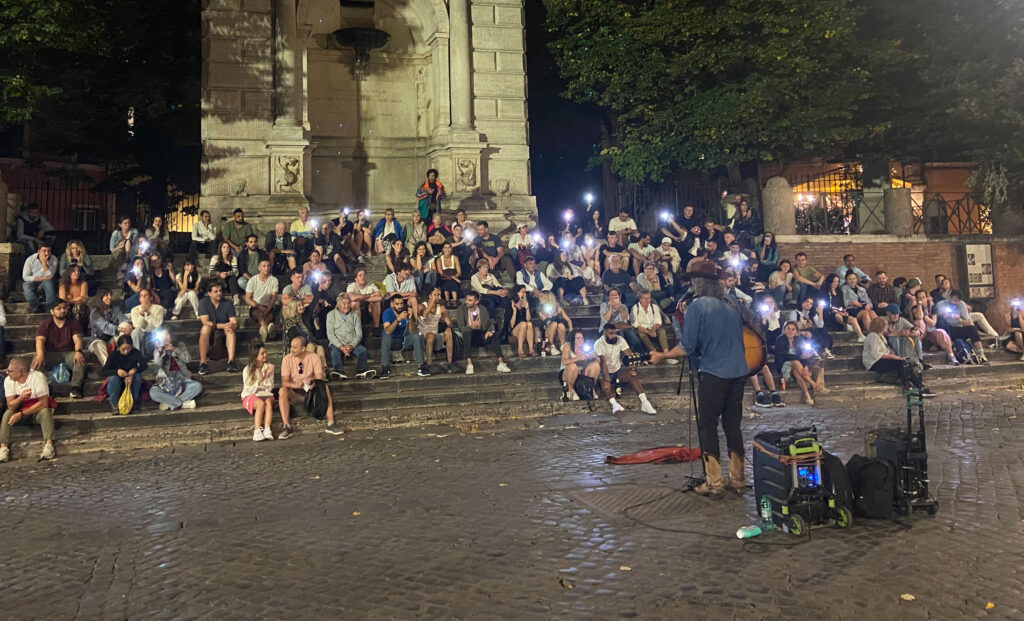 Piazza Trilussa in Trastevere with live street music at night