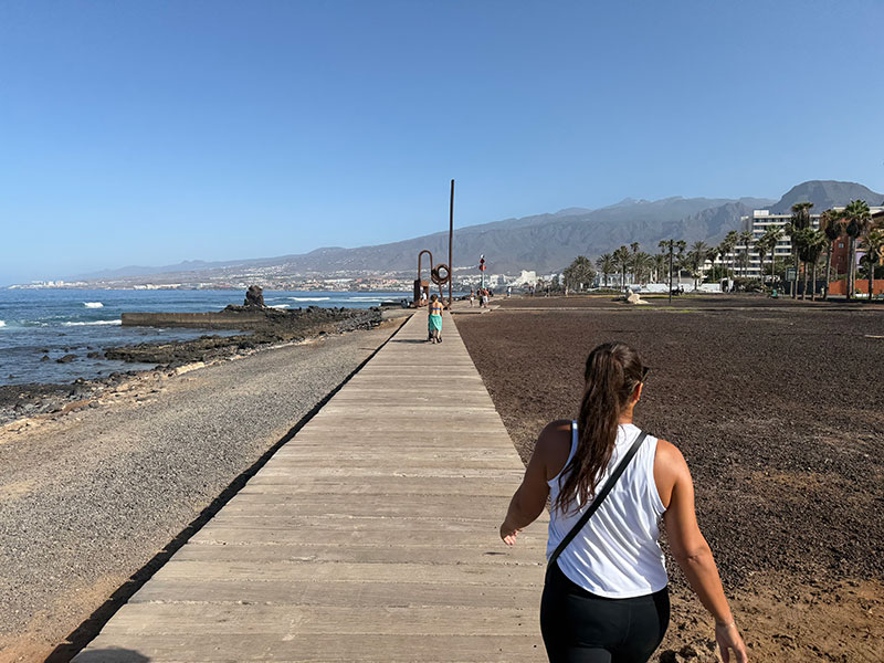Walking the Malecón in South Tenerife along the oceanfront promenade