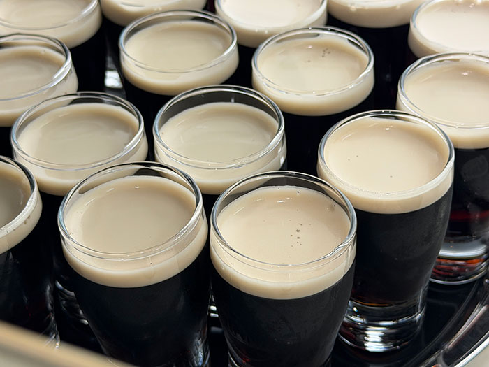Tasting Guinness beer on the tour in Dublin, Ireland