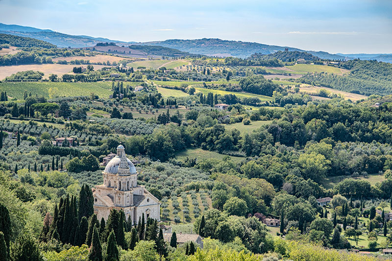 Sweeping landscape view of Tuscan hills and vineyards from the hill town of Montepulciano