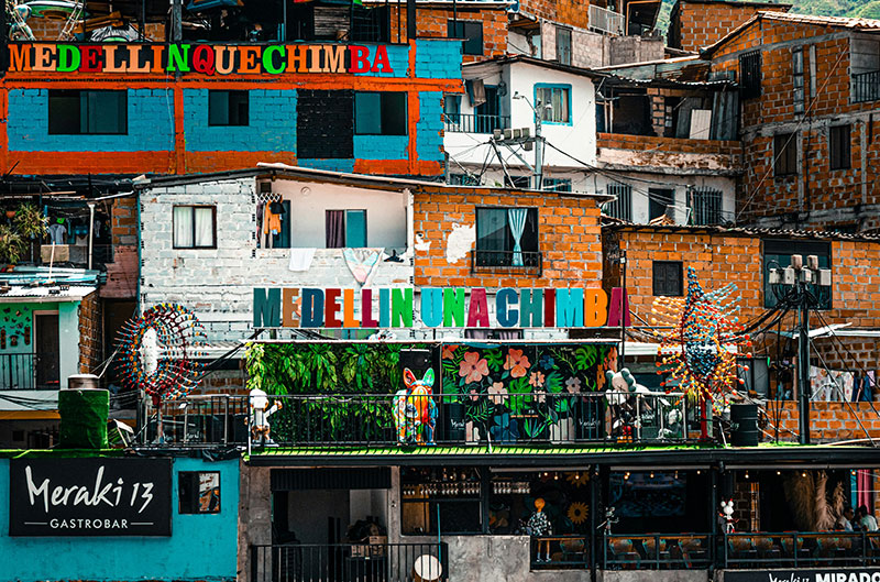 Brightly colored building facade with intricate details in Medellin, Colombia.
