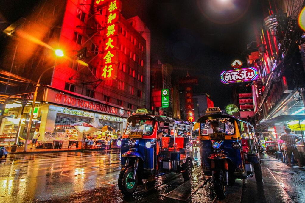 Based on the image preview in your WordPress media library, here are suggestions for the Alt Text and Caption fields for bangkok-street-view-with-tuk-tuks.jpg. This image appears to be taken on Yaowarat Road (Bangkok's Chinatown) given the distinct large red-and-gold neon signs. Suggested Alt Text Night view of three illuminated tuk-tuks parked on a wet street in Bangkok's Chinatown (Yaowarat Road) under bright red neon signs.