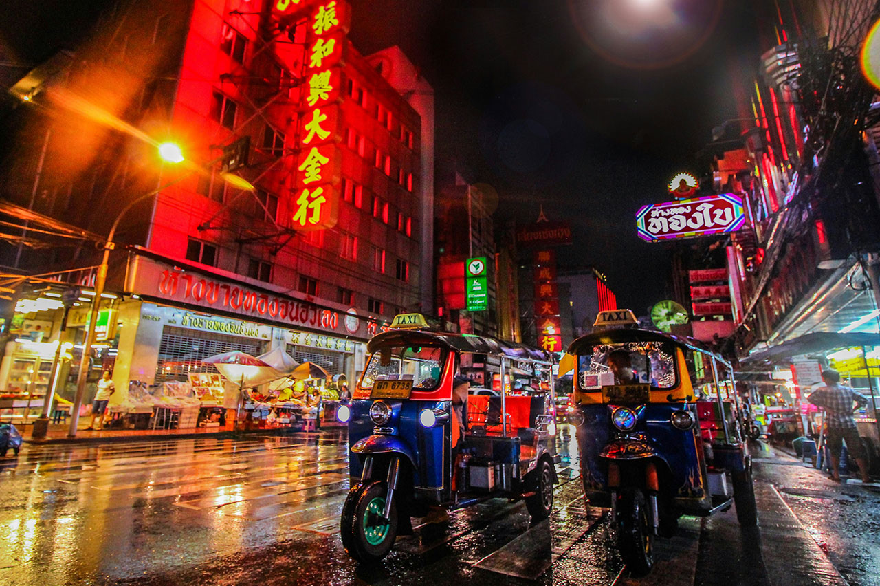 Based on the image preview in your WordPress media library, here are suggestions for the Alt Text and Caption fields for bangkok-street-view-with-tuk-tuks.jpg. This image appears to be taken on Yaowarat Road (Bangkok's Chinatown) given the distinct large red-and-gold neon signs. Suggested Alt Text Night view of three illuminated tuk-tuks parked on a wet street in Bangkok's Chinatown (Yaowarat Road) under bright red neon signs.