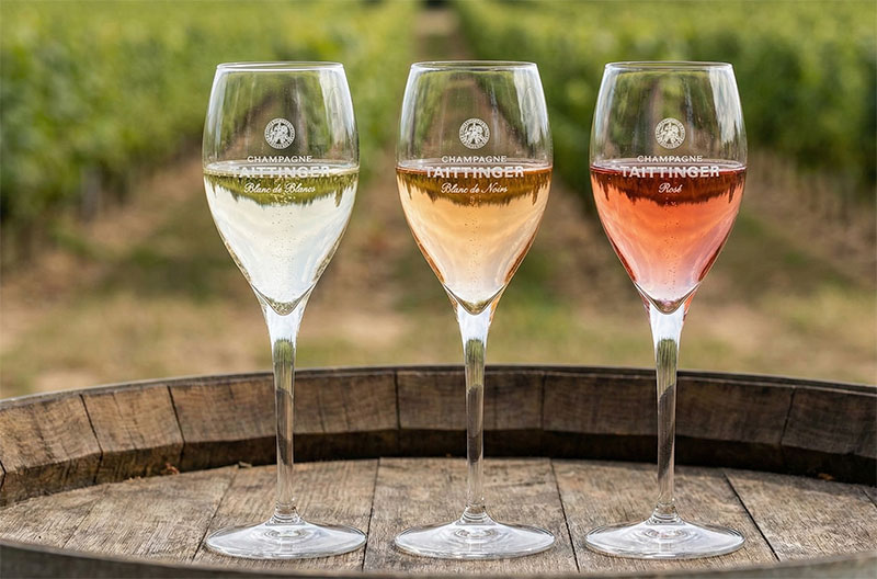 Three glasses of champagne showing different color variations, representing Blanc de Blancs, Blanc de Noirs, and Rosé styles.