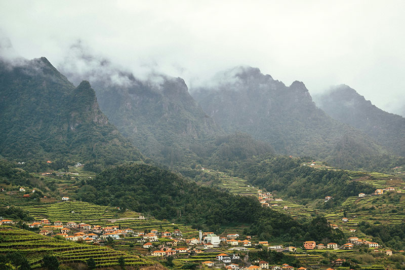 Misty green mountains and valleys in the Colombian Andes, showcasing the lush landscape.
