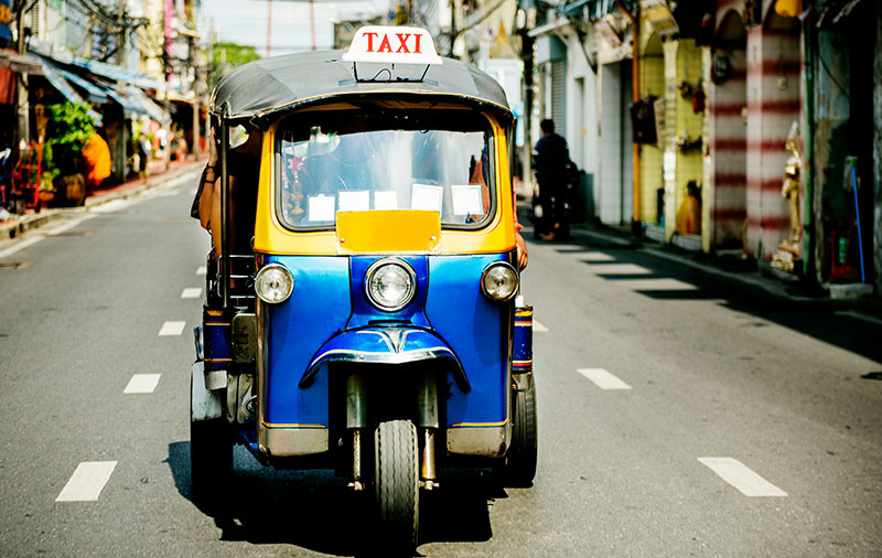 Based on the selected image tuk-tuk-scams.jpg, which shows a blue tuk-tuk on a sunny street, here are suggestions for your Alt Text and Caption fields. Given the filename and your blog section on "Scams: How to Outsmart Them," these options are tailored to fit that context. Alt Text A blue motorized tuk-tuk driving down a sunny street in Bangkok.