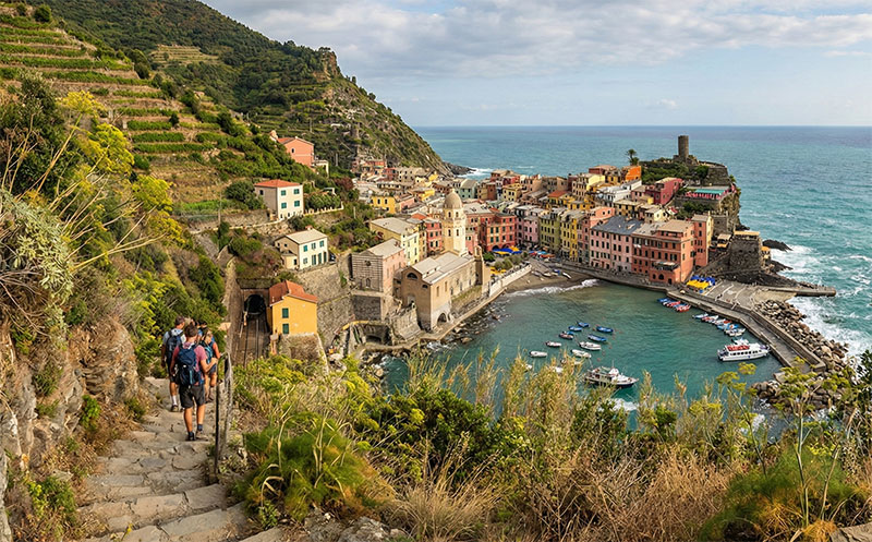he view that makes the cardio worth it: Looking back at Vernazza's harbor from the steep stone steps of the Blue Trail.