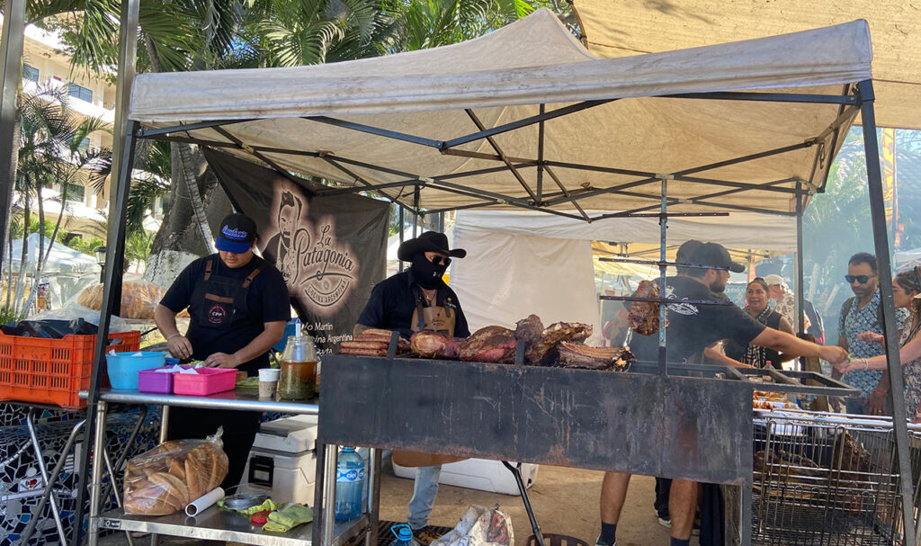 Grilling up some deliciousness at the Olas Altas Saturday Market.