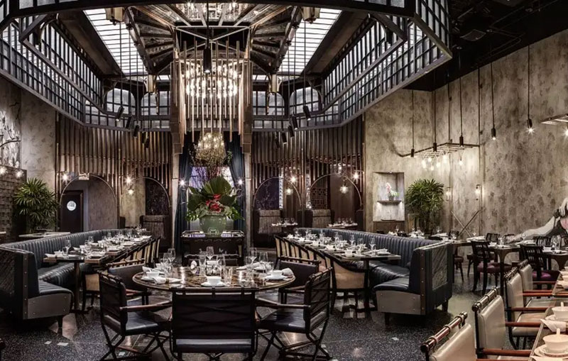 An interior view of an elegant dining room at The Venetian Las Vegas, featuring intricate architectural details, warm lighting, and a sophisticated atmosphere.