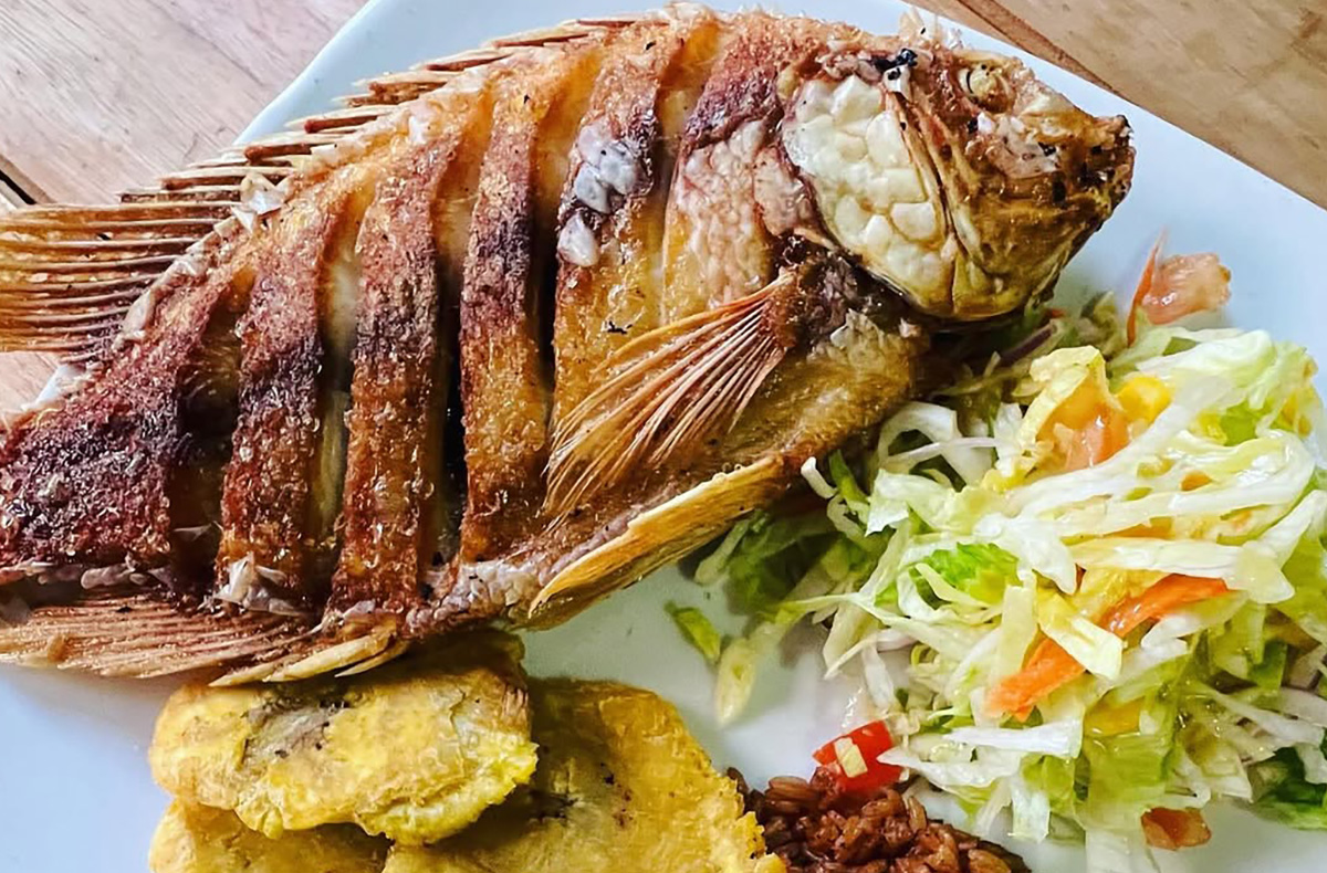 Deep-fried whole fish (Mojarra Frita), Coconut Rice, Tostones