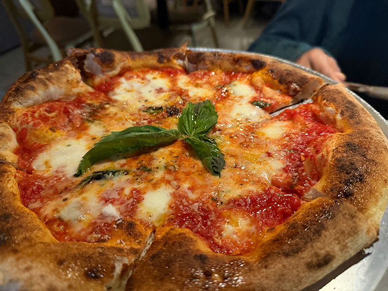 Wood fired Margherita pizza at La Sagrada Pizzeria in Mazatlán, Mexico.