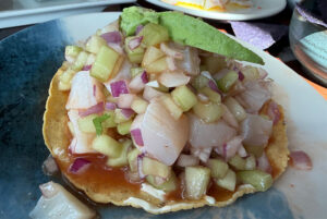 Scallop ceviche tostada with cucumber, red onion and avocado at Los Arcos Mazatlán