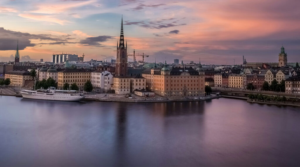 Panaromic view of the Stockholm skyline and Riddarholmen church at sunset from the Mariaberget lookout point.