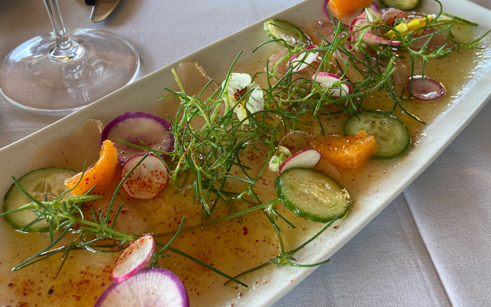 Artfully plated citrus and cucumber salad at The Stonehouse restaurant in Montecito.