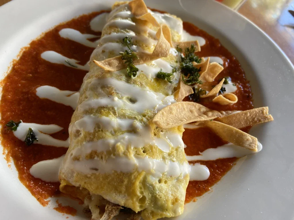 An omelet with sauce and a drizzle of cream at Rico’s Café in Mazatlán.